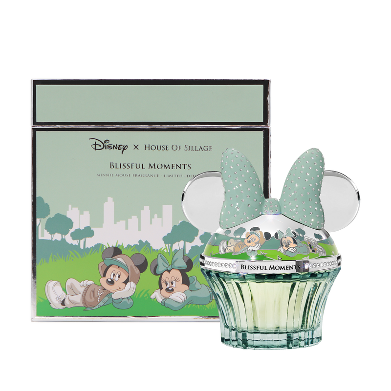 Light green box with silver and green bottle with house of sillage parfume