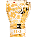 Gold and white decorative  luxury lipstick with floral patterns and 'House of' branding on a white background