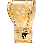 Gold decorative item with floral design and 'Village' branding on a white background